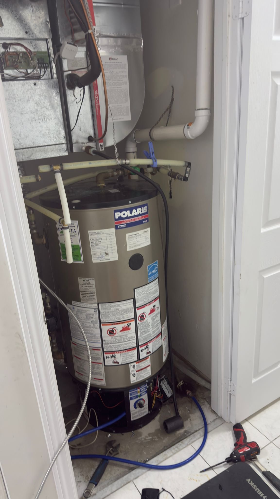 Polaris water heater installation utility closet GTA home