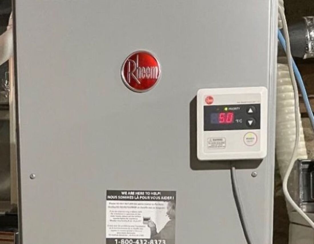 Rheem tankless water heater installed in a GTA basement
