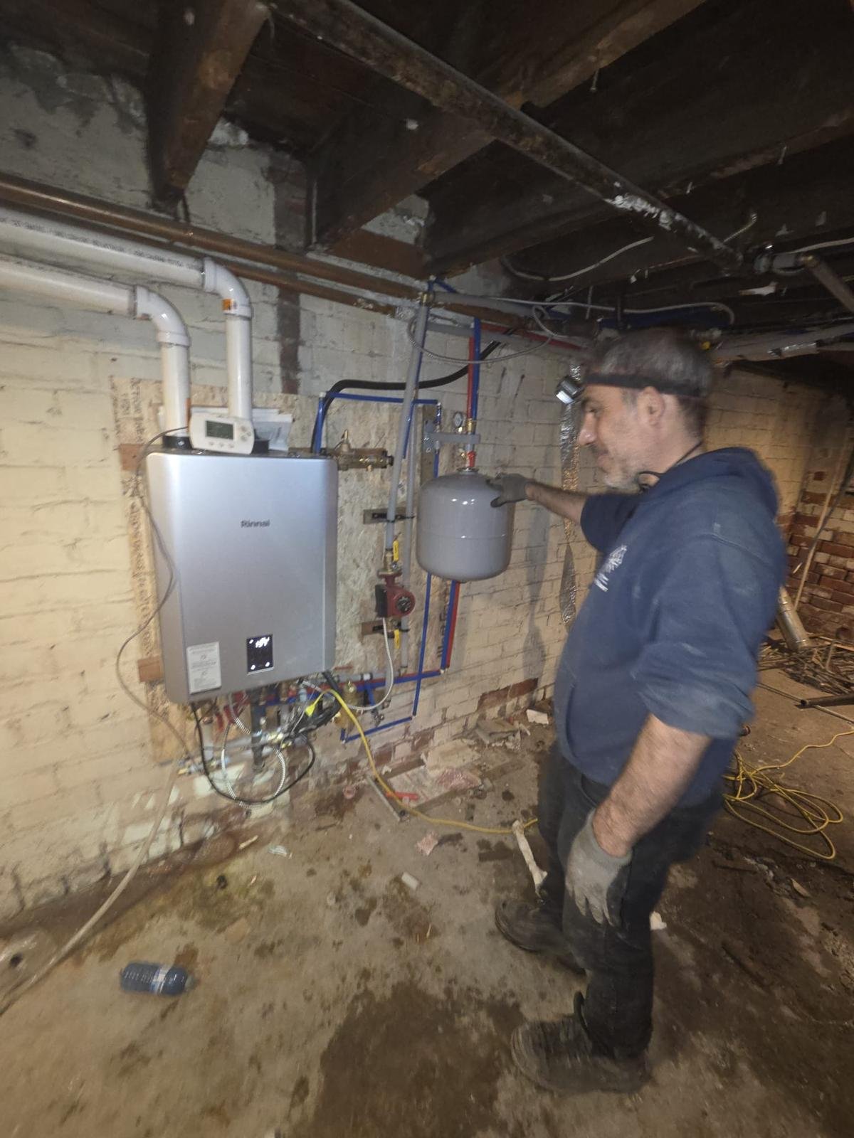 Rinnai tankless water heater installation basement GTA home