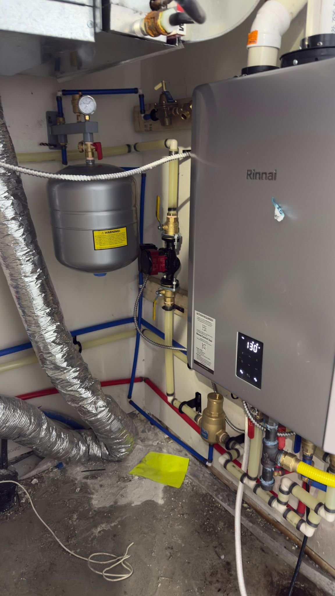 Rinnai tankless water heater mechanical room installation GTA